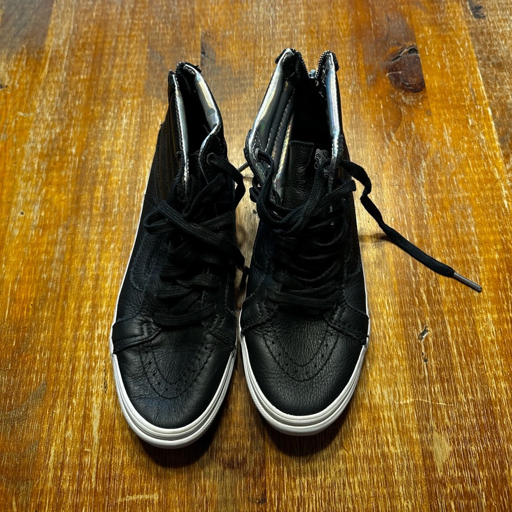 Black High-Top Vans Sneakers